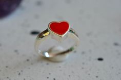 Sterling silver enamel heart ring inlay with red color enamel.  The vibrant red enamel ring.  Silver 925 enamel heart ring best for a gift for your best friend, sister or mom.  Lover ring, Valentine ring, Gift for her Material       :   Sterling silver Dimension  :   heart 8 x 8 mm The ring comes in gift box ready for a gift. Please give your phone no. for courier service. Please read our policies for information on international shipping, returns and exchanges. If you need any additional help or have any questions at all please feel free to convo me. Thanks for visiting us & Have a nice day!! Heart-shaped Enamel Ring For Anniversary, Valentine's Day Enamel Heart Ring For Anniversary, Red Enamel Ring For Gift, Red Enamel Rings For Gift, Valentine's Day Red Heart Sterling Silver Ring, Valentine's Day Enamel Heart Ring, Red Heart-shaped Sterling Silver Rings, Enamel Heart Shaped Promise Ring, Red Sterling Silver Heart-shaped Rings