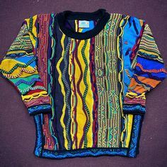 Coogi Vintage 3d Knit Multicolored Crewneck Sweater Cotton Unisex Size Medium This Coogi Vintage 3d Knit Multicolored Crewneck Sweater Is A Must-Have For Any Fashion Enthusiast. Made With High-Quality Cotton, This Unisex Sweater Is In Excellent Condition With No Rips Or Tears. The Unique 3d Knit Design Adds A Touch Of Vintage Charm To Any Outfit. Own A Piece Of Fashion History With This Pre-Owned Gem. Please Be Aware That All Vintage Items Will Usually Show A Few Signs Of Wear Or Slight Fading Due To Age, But Anything Visible Such As Stains, Rips Or Holes Will Be Noted In The Item Description. Vintage Sizes Do Vary, But I Try My Best To Accurately Describe The Size &Amp; Fit Of An Item By Radiohead Sweater, Coogi Sweater, Vintage Christmas Sweaters, Sweater Cotton, Fashion Enthusiast, Unisex Sweater, Men's Apparel, Sweaters Crewneck, Fashion History