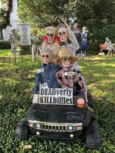 a car that has been decorated to look like skeletons on the front and back with dead heads