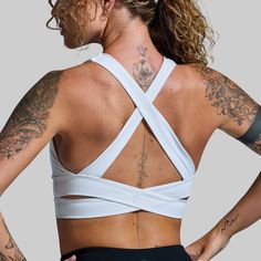 With a longer body and crossed straps in the back, this sports bra was designed with the perfect balance of flexibility and support. Made with our signature BPLegacy fabric to move with you and provide ample support for nearly any activity. Bonus, this sports bra can double as a bathing suit top. Crisscross Sports Bra With Built-in Bra, Cross Back Sports Bra With Built-in Bra For Training, Supportive Cross Back Sports Bra With Built-in Padding, High Stretch Cross Back Sports Bra With Built-in Padding, Activewear With Built-in Bra For Gym, Crisscross Design, Sporty Crisscross Sports Bra, Sporty Stretch Crisscross Sports Bra, Stretch Crisscross Sports Bra, Sporty Crisscross Sports Bra For Pilates