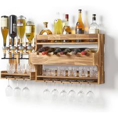 a wooden shelf filled with lots of bottles and glasses