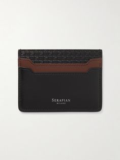 A sleek alternative to bulky wallets, Serapian's cardholder has a central compartment and four slots for your most-used cards. It's been handcrafted in Italy from leather and stamped with the label's foil moniker. Designer Card Holder With Interior Slots, Black Card Holder With Interior Slots For Formal Occasions, Designer Leather Wallet With Card Slots, Black Card Holder With Interior Slots For Formal Use, Designer Leather Card Holder, Formal Black Card Holder With Card Slots, Classic Leather Card Holder With Embossed Logo, Modern Leather Card Holder With Embossed Logo, Formal Leather Card Holder With Slots