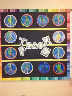 a bulletin board with peace signs on it