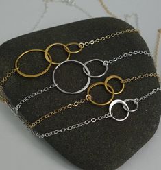 I love these necklaces because they are both simple, and elegant. A great necklace for everyday. Forever linked, eternal circles form the center of this beautiful necklace whether you choose two circles or three. Circles are a symbol of eternity, of love. This is the perfect necklace for sisters, bridesmaids, wife, mom, grandmother, mother and child, best friends and of course the ultimate one to express your love to - yourself. :) The silver necklaces are all in solid sterling silver, while the Sweet 16 Birthday Gifts, Double Circle Necklace, Interlocking Circle Necklace, 20th Birthday Gift, Wedding Bridesmaid Jewelry, Small Necklace, Large Necklace, Special Necklace, 16th Birthday Gifts