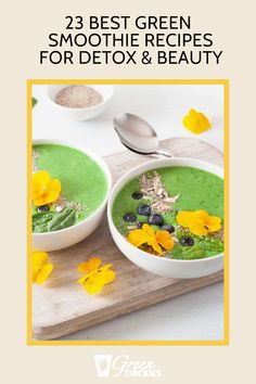 two bowls filled with green smoothie and flowers