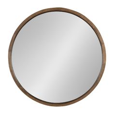 the round mirror is made from wood and has a wooden frame with a metal ring around it