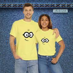 Looking for a fun and unique Halloween costume? This unisex t-shirt is perfect for you! Featuring a playful design inspired by everyone's favorite yellow creatures, this shirt is sure to bring some laughs to any Halloween party. Made from 100% sustainable and highly durable cotton, this shirt is perfect for year-round comfort. The classic fit ensures a relaxed and comfy wear, while the crew neckline adds a timeless touch that can blend into any occasion, casual or semi-formal. No side seams mean there are no itchy interruptions under the arms, and the shoulders have tape for improved durability. This t-shirt is also certified by Oeko-Tex for safety and quality assurance, so you can feel good about your purchase. Get ready to stand out this Halloween with this fun and playful t-shirt! Cute Yellow T-shirt For Playtime, Casual Yellow T-shirt For Playtime, Yellow T-shirt With Funny Print, Minion Face, Minion Shirts, Yellow Cotton T-shirt With Funny Print, Minion Halloween, Yellow Pop Culture Short Sleeve T-shirt, Comfy Wear