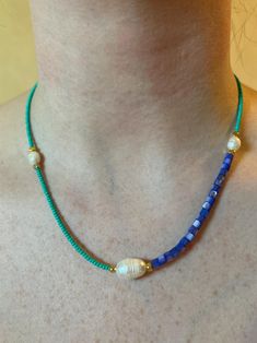 Beautiful asymmetrical beaded necklace made with beads sourced from Istanbul, Turkey. Necklaces made of  blue dyed shell beads, Freshwater pearls and teal green seed beads and finished with a gold color lobster claw closure. Perfect for adding charms and layering ❤️ PLEASE NOTE- I am currently traveling and won't be back in the states until the week of September 10, 2024. Any items purchased before then will not be shipped until AFTER Sep 11, 2024. THANK YOU FOR YOUR UNDERSTANDING. Handmade Beaded Necklaces, September 10, Shell Beads, Istanbul Turkey, Teal Green, Teal Blue, Lobster Claw, Candy Cane, Freshwater Pearls