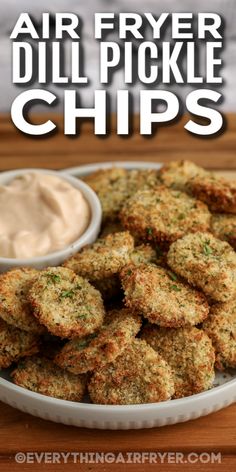 air fryer dill pickle chips on a plate with ranch dip in the background