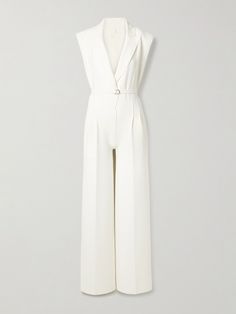 Norma Kamali's jumpsuit combines the sharpness of tailoring with the comfort of its signature jersey fabric. Cut from a white version, it has a sleeveless silhouette with blazer-inspired peak lapels and pleats along the straight legs. Use the optional belt to cinch your frame. White Sleeveless Jumpsuit For Formal Occasions, Elegant White Sleeveless Pantsuit, White Sleeveless Jumpsuits And Rompers For Formal, White Sleeveless Jumpsuits And Rompers For Formal Occasions, Elegant White Jumpsuit For Formal Occasions, White Fitted Jumpsuit For Formal Occasions, White Fitted Jumpsuits And Rompers For Formal Occasions, White Fitted Formal Jumpsuits And Rompers, Luxury White Fitted Pantsuit