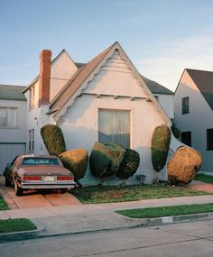 an instagramted photo of a house with trees in the front yard