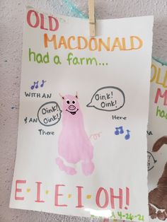 a sign hanging on the wall that says old mcdonald had a farm and an elephant