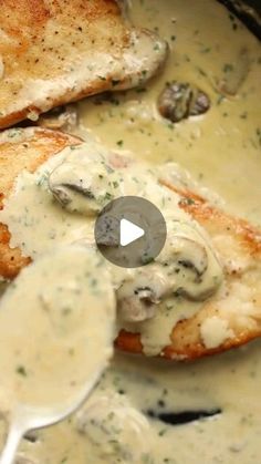 chicken with mushroom gravy in a skillet