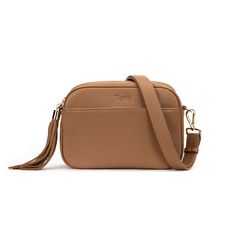 We call this the Mary Poppins bag for a reason. You can fit everything you need for all day on the go activities. Larger than the average cross body, organisation meets all day style. THE tan cross body bag by TOTTIE is large enough for more than just the essentials with all the pockets and space you need to keep your you-know-what, together. Minimalist in tan with a luxe vibe, her clever design with the practicality every woman wants, but doesn't know exists, make her irresistible. She’s a prem Mary Poppins Bag, Poppins Bag, Tan Cross Body Bag, Nappy Bag Backpack, Baby Bag Backpack, Wallet Insert Card, Caddy Bag, Nappy Bag, Mary Poppins