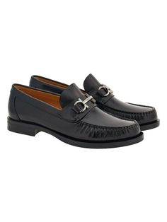 Step up your style game with these sleek and sophisticated loafers. Made from luxurious black calf leather and goatskin, they feature a branded leather insole and a chic Gancini plaque, perfect for adding a touch of refinement to any outfit. With their almond toe and slip-on style, these loafers are as comfortable as they are stylish. Black calf leather and goatskin Branded leather insole Gancini plaque detail Almond toe Slip-on style Flat sole Prada Designer, Balenciaga Designer, Fashion Flats, Leather Loafers, Designer Sunglasses, Watch Design, Step Up, Calf Leather, Designer Shoes