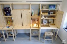 the children's desk and bookshelf are made out of wood