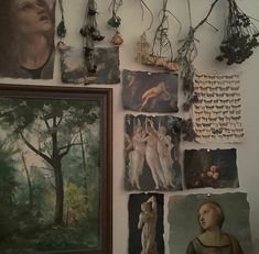 there are many paintings and pictures on the wall