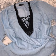 Nwot. Clean & In Excellent Condition. No Flaws. Cotton On Chambray Peplum Wrap Around Blouse. Front V-Neck Ruffles, Side Wrap Around Tie; Which Can Be Loosed Or Left Opened As Another Wearing Option. 3/4 Sleeves W/Ruffle. 100% Lyocell - No Stretch Size: Xs Approximately: A To A 15”; Shoulder To Hem 20” *Black & Pink Bralettes Are Not Part Of This Listing. Styling Ideas Only. Wrap Around Blouse, Peplum Blouse, Styling Ideas, Neck Ruffle, Cotton On, Cotton Tops, Wrap Around, Chambray, Bralette