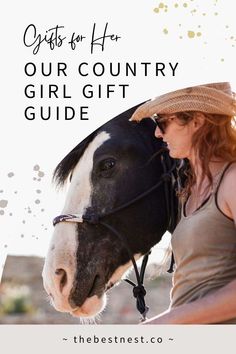 a woman is petting a horse with the words gifts for her our country girl gift guide