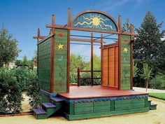 an outdoor play structure with steps and a porch