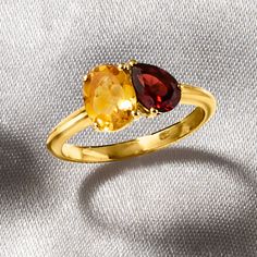 Ross-Simons - 1.10ct Citrine, .90ct Garnet Toi et Moi Ring Over Sterling. Size 9. French for "you and me," Toi et Moi rings are a unique way to celebrate a special relationship in your life. Wear our on-trend, two-stone designs as a sentimental symbol of romance, friendship, family - or simply treat yourself to double the sparkle! This fiery statement features a 1.10 carat oval citrine shimmering beside a .90 carat pear-shaped garnet. Crafted in polished 18kt yellow gold over sterling silver. 1/4" wide. Garnet and citrine two-stone ring. Garnet birthstones are the perfect gift for January birthdays. Garnet Birthstone, Citrine Ring, Stone Design, Garnet Rings, Birthstone Ring, Stone Ring, Womens Jewelry Rings, Buy 1, Pear Shaped