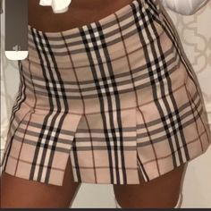 Nwot Burberry London Pleated Nova Check Mini Skirt With Slits. Has Belt Loops So You Can Wear It With Any Belt, I Personally Like A Black Gucci Belt. Size Us-8, Uk-10. Material Is 100% Wool. Made In Scotland. The Waist Laying Flat Across Measures 16" And The Length Measures 14.5". The Skirt Is In Perfect Condition! Also One Of The Most Sought After Styles Ever Made And No Longer Made. The Skirt Is In Perfect Condition. Made In Scotland. Just A Reminder No Belt Included But Has Belt Loops. Trendy Split Skirt Bottoms, Trendy Skirt With Split Design, Fitted Mini Skirt With Split Design, Trendy Fitted Bottoms With Split, Casual Mini Skirt With Split Design, Casual Pencil Skirt With Split Design, Chic Fitted Mini Skirt With Split Design, Fitted Skirt With Split Design, Fitted Mini Skirt Bottoms With Split Design