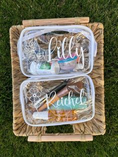 two baskets with personalized items in them on the grass, one is filled with pens and pencils