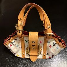 Authentic Lv Bag Condition: Very Good (Little Creases On Bag Strap) Color: White, Rainbow (Multi-Color), Gold Hardware, Wine Red (Inside) Inside: One Open Pocket, Open Space, Good Condition Outside: Leather Trim, Leather Drawstrings With Gold Ball Charms, Gold Belt Buckle, Leather Shoulder Straps, Good Condition No Dust Bag, Tag, Or Box No Receipt White Monogram Canvas Bag With Detachable Handle, Multicolor Rectangular Monogram Canvas Bag, Multicolor Top Handle Bag With Branded Hardware, White Monogram Canvas Satchel Bag, Daily Use Multicolor Monogram Canvas Bag, White Monogram Canvas Shoulder Bag, White Monogram Canvas Shoulder Bag With Branded Hardware, White Monogram Canvas Shoulder Bag With Double Handle, White Monogram Canvas Satchel Shoulder Bag