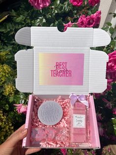 the best teacher gift set is in a pink box