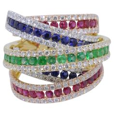 18 K WHITE AND YELLOW Gold Cocktail RING WITH DIAMONDS & EMERALDS, SAPPHIRE , inspired by De Grisogono overlaying with multi colours 18K White and Yellow Gold - 16.53gm 20 EMERALDS -0.56 CT 30 RUBIES - 1.13 CT 29 SAPPHIRES - 1.27 CT 225 ROUND DIAMONDS - 2.03 CT Luxury Multi-stone Enamel Anniversary Ring, Fine Jewelry Yellow Multi-stone Diamond Ring, Yellow Multi-stone Diamond Ring Fine Jewelry, Luxury Yellow Sapphire Multi-stone Jewelry, Luxury Yellow Sapphire Ring, Fine Jewelry, Yellow Gold Cocktail Ring, White Cocktail, Gold Cocktail Ring, Modern Engagement Rings