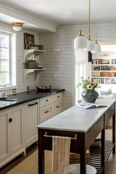 the kitchen is clean and ready to be used as a dining room or living room