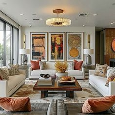 a living room filled with furniture and lots of windows