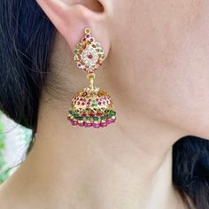 Featuring a pair of medium sized jadau jhumka earrings in 22k gold, set with precious rubies, emeralds and pearls. The earrings weigh 21.17 gms including 3.2 gms in the hanging ruby emerald beads. Hand-set 22k Gold Jhumkas For Celebrations, 22k Gold Hand Set Jhumkas For Celebration, Bollywood Style 22k Gold Hand Set Jhumkas, Festive 22k Gold Hand Set Jhumkas, Bollywood Style 22k Gold Jhumkas, Festive 22k Gold Fusion Style Jhumkas, Ceremonial Kundan Jhumkas With Hallmark, Ceremonial Kundan Jhumkas Hallmarked, Festive Fusion Style 22k Gold Jhumkas