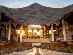 an outdoor gazebo with steps leading up to it