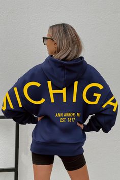 Bring the energy of the game to your wardrobe with our Michigan Wolverines oversized premium weight hoodie with ribbed cuff and waistband. Be the ultimate Michigan Wolverines fan with this versatile and trendy item. Go Blue Michigan Wolverines, Central Michigan University Apparel, University Of Michigan Sweatshirt, Michigan Wolverines Apparel, University Of Michigan Wolverines, Michigan Wolverines, Ann Arbor, The Energy, Pet Hair