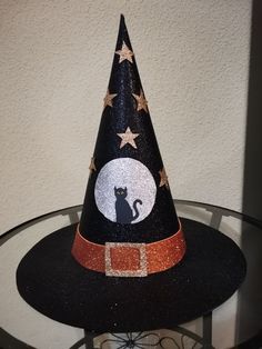 a witches hat with a cat on it