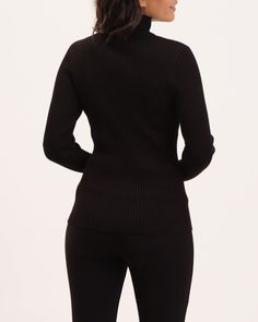 Stylish and versatile women's sweater from Elie Elie Tahari. Crafted from a lightweight and breathable viscose blend fabric, this pullover features shaped ribbing for a stylish silhouette. A gold metal logo bar adds subtle sophistication, and the funnel neck and long sleeves add warmth. Funnel neck Long sleeve Pullover style Shaped body Ribbed Gold metal logo bar 24" body length Models are 5'9" and 5'11" wearing size S Viscose blend Machine washable Style: EH225044 Funnel Neck Sweater, Elie Tahari, Metal Logo, Affordable Luxury, Funnel Neck, Metallic Logo, Funnel, Long Sleeve Pullover, Pullover Styling