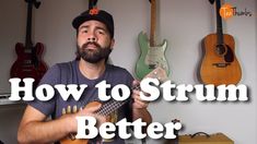 a man holding a ukulele with the words how to strum better