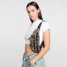 This fanny pack comes with an animal print design. It is made of canvas and our logo is embroidered on the front. Very easy to wear with our shorts and t-shirts. Fanny Pack, Animal Print, Print Design, ? Logo, Canvas, Animals, T Shirt, How To Wear, Design