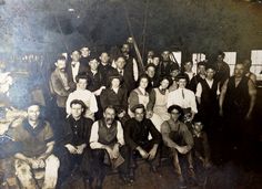 an old black and white photo of many people