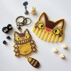 PLEASE READ BEFORE PURCHASE My neighbor Totoro inspired Catbus hair comb and shaker keychain. We use two different types of glue and resin to secure the tail. However, depending on how you use it, tail MAY FALL OFF so please keep that in mind before making a final decision. (You can always glue it back on with E6000 or with bit of Gorilla super glue) This is all handmade and handpainted per order so there will be slight imperfections. If you are sensitive about imperfections, please do not purch Resin Shaker Keychain, Shaker Keychain, Neighbor Totoro, Studio Ghibli Movies, My Neighbor Totoro, Cute Keychain, Super Glue, Hair Comb, Clay Art