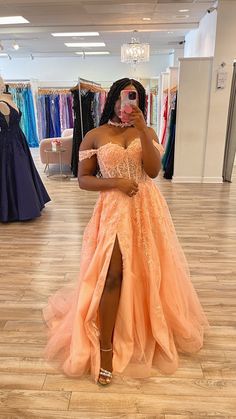 Light peach prom ballgown with glitter skirt, sheer corset bodice, choker, off-the-shoulder sleeves, and more. Dress by Ellie Wilde. prom prom 2023 prom dress prom gown prom 23 prom szn peach prom dress pink prom dress ballgown prom dress Prom Dresses Plus Size Corset, Flowy Pink Prom Dress, Coral Orange Prom Dress, Peach Pink Prom Dress, Prom Dresses Orange Coral, Peach Prom Dress Coral, Pink Prom Dress Plus Size, Light Orange Prom Dress, Prom Dresses For Chubby Girls