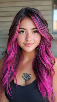 Style your hair with magenta pink balayage for a vibrant contrast with tan skin. Visit our page for tips on achieving this stunning color. Save this pin for balayage inspiration! Tags: #MagentaPinkBalayage #HairColor #TanSkin Wild Hair Colors For Brunettes, Balayage Hair Vivids, Pink Fall Hair Color, Punk Balayage, Vibrant Color Hair, Pink Hair Peekaboo Brunettes, Fuchsia Pink Hair, Brown And Colorful Hair, Colored Balayage Hair