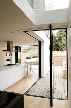 an open living room with sliding glass doors