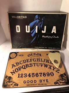 an old ouja sign is on display in a museum