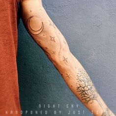 a person with a tattoo on their arm