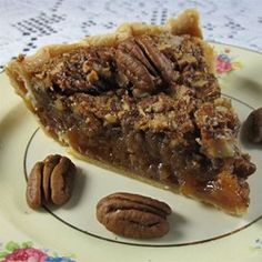 a slice of pecan pie on a plate