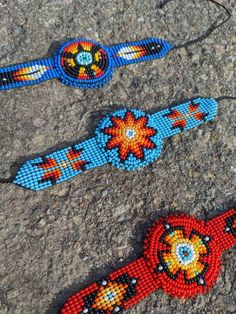 Bead work is an art form expressed and practiced throughout Native American Tribes. Each tribe has designs, colors, patterns and techniques that they are identified by. Here we have a few Original one of a kind handmade colorful beaded bracelets. Length aprx: 6 inches(bead work) total length 15 inches. width aprx : 1.5 inches Average weight aprx: 14.4 grams If you need more pictures or have any questions feel free to contact me, I will get back to you as soon as possible. *Customer service is ve Traditional Blue Beaded Bracelets For Festivals, Southwestern Adjustable Beaded Bracelets, Southwestern Style Adjustable Friendship Bracelets With Round Beads, Bohemian Beaded Wristband For Festivals, Southwestern Style Adjustable Bracelets For Festivals, Bohemian Round Beaded Wristband For Festivals, Southwestern Adjustable Jewelry For Festivals, Artisan Bracelets With Round Beads For Festivals, Handmade Adjustable Southwestern Friendship Bracelets