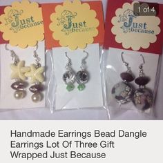 three earrings in packaging with the text handmade earrings bead dangle earring lot of three gift wrapped just because