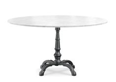 a white table with black legs and a round marble top on an isolated pedestal, viewed from the front